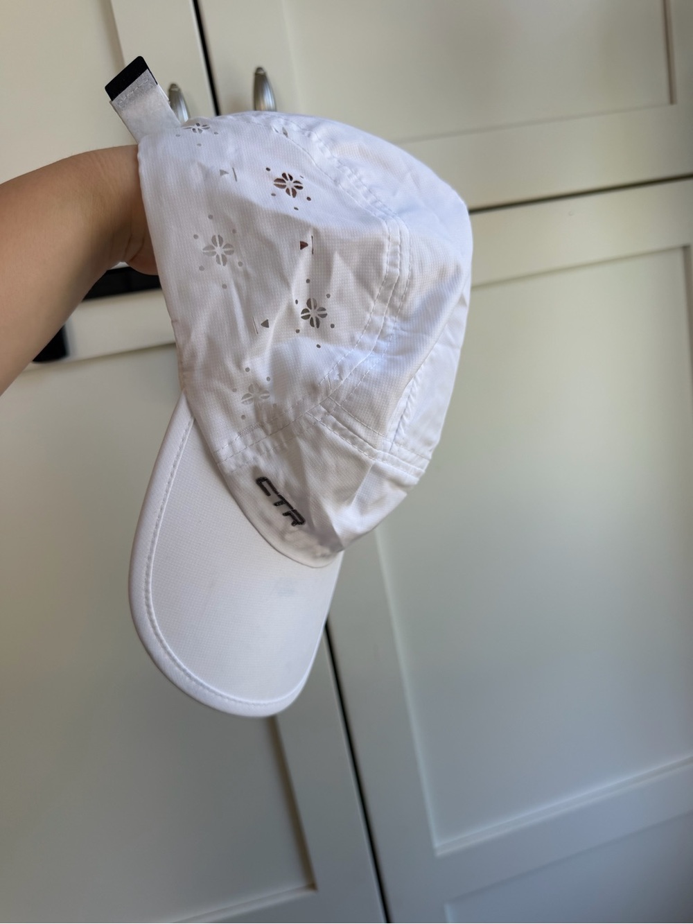 White Cap with Floral Cutouts